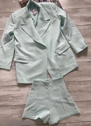 Женский фирменный костюм  мятный цвет