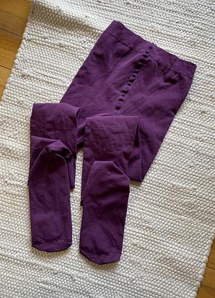 Фіолетові колготи, еластичні й стильні, з декоративним поясом.