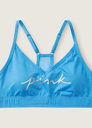 Спортивний бюстгальтер від бренду victoria's secret модель pink ultimate sports lightly lined bra.