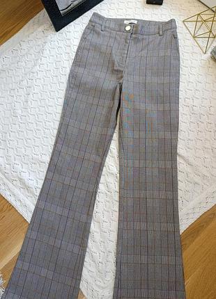 Брюки клеш в клетку