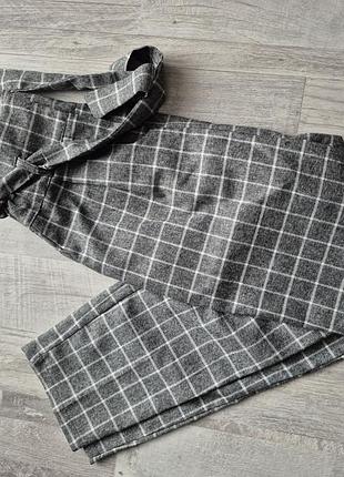 Штани класичні в клітинку з поясом