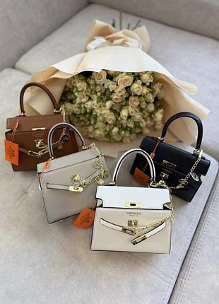 Сумка , в комплекті пильник та довгий ремінець