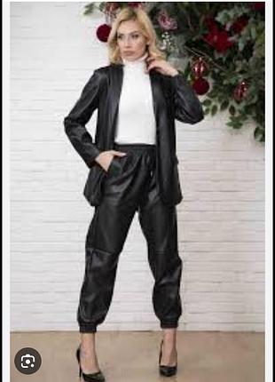 Костюм эко шкира  р.38 express