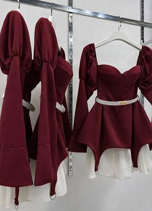 Незвичайна жіноча сукня міні з чашками та розкльошеною спідницею приталена з широкими довгими рукавами