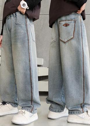 Блакитні джинси з резинкою на талії