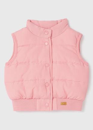 Рожевий дитячий жилет від бренду matalan, призначений для дітей від народження до 23 місяців.