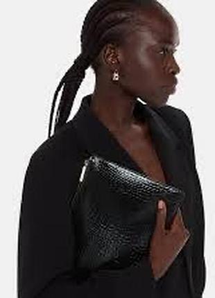 Шкіряний клатч з тисненням