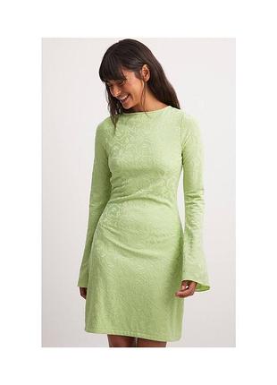 Стильна жакардова сукня з голою спиною