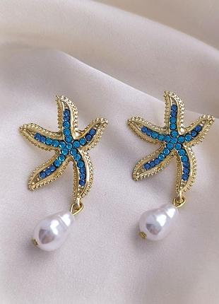 Гарні сережки морські зірки із блакитним камінням 💎