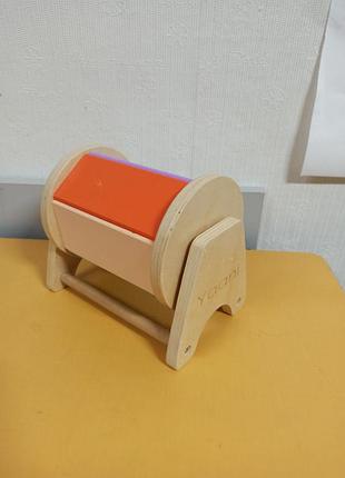 Дерев'яний обертовий барабан монтессорі від бренду yaani