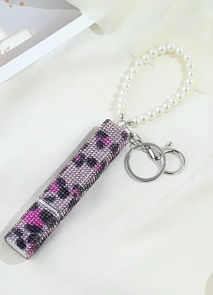 Атомайзер для парфумів у рожево-леопардових стразах з перлинним паском