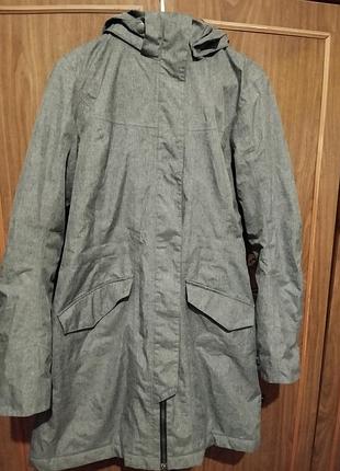 Куртка жіноча подовжена.