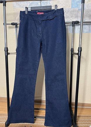 Темно сіні еластичні джинси кльош
