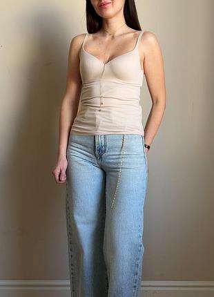 Бежевий безшовний топ бюстье з вшитими чашками airism від uniqlo, шикарні якість, дуже приємний до тіла