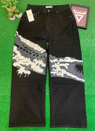 Джинси lacoste