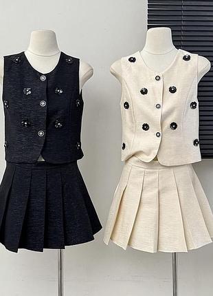 Нові класні стильні костюми на літо жіночі жилетка і спідниця