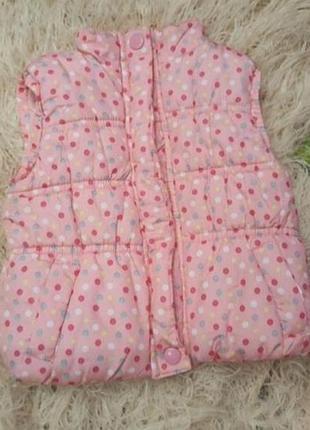 Рожевий жилет у горох