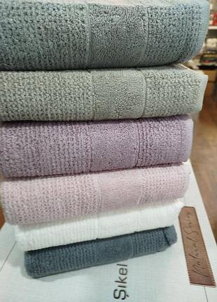 Полотенца махровые