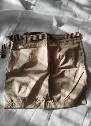 Жіноча спідниця бежевого кольору з поясом та блискавкою вшитою збоку