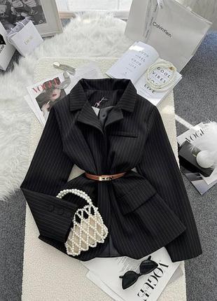 Жіночий класичний піджакз костюмної тканини на полістеровій підкладці