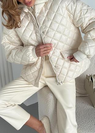 Стеганая куртка  с карманами