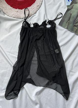 Майка з пірсингом