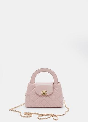 Chanel top handle flap bag in light pink quilted leather with gold-tone hardware