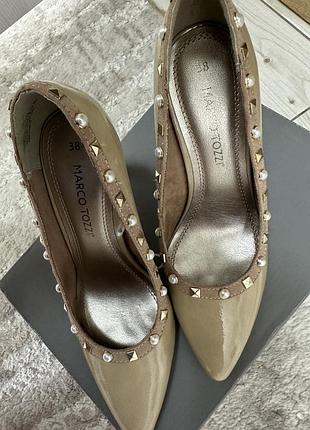 Продам нові тіфлі marco tossi