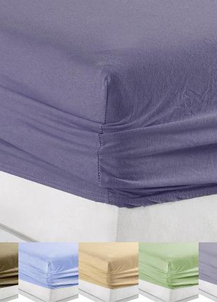Щільне натяжне простирадло на резинці 140x200 трикотажна, простінь для матраца натяжна на гумці полуторна туреччина фіолетовий