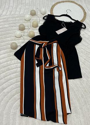 Актуальная классическая юбка меди с имитацией запаха.