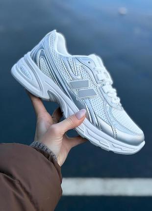 Кросівки жіночі stilli сріблясті