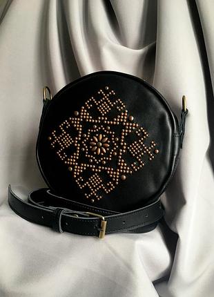 Шкіряна кругла жіноча сумка