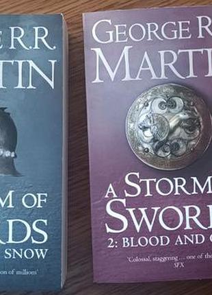 Книга англійською в двох томах a storm of swords. george r. r. martin