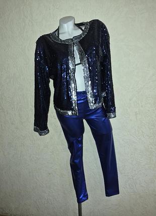 Жакет праздничный с пайеточной ткани синего цвета