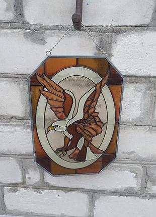 Вітражний ловець сонця (suncatcher) із зображенням білоголового орлана.