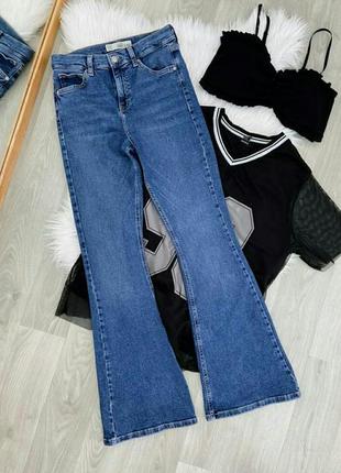 Niyade джинсы расклешенные синие с высокой посадкой клеш