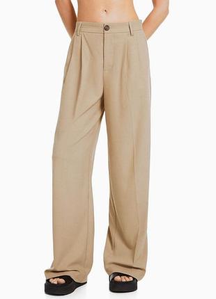 Широкі штани суворого крою. палаццо ,класичний стиль, спереду гудзик. штани bershka (258455374)