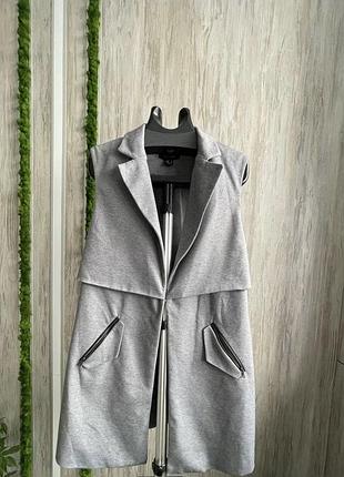 Стильный женский жилет без рукавов