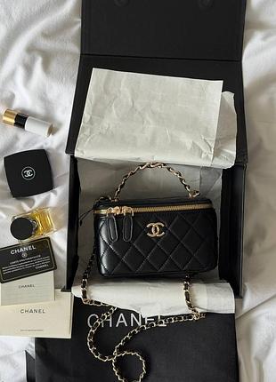 Класична чорна жіноча сумка із натуральної шкіри з довгим ремінцем через плече та короткою ручкою