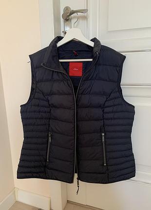 Жіноча жилетка