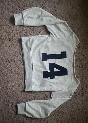 Новая кофта. можно носить на одном плече