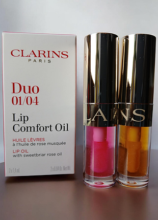 Clarins lip comfort олійка для губ зі зволожуючим ефектом набір 2×1.4 ml колір 01 honey і 04 pitaya