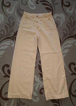 Джинсы широкие