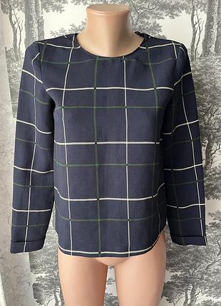 Блуза в клітинку на замок