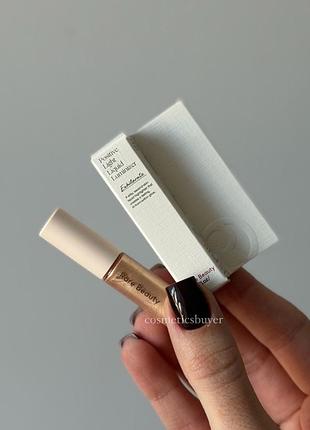 Рідкий золотистий хайлайтер rare beauty by selena gomez positive light liquid luminizer highlight exhilarate