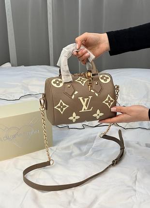 Жіноча бежева шкіряна сумка
