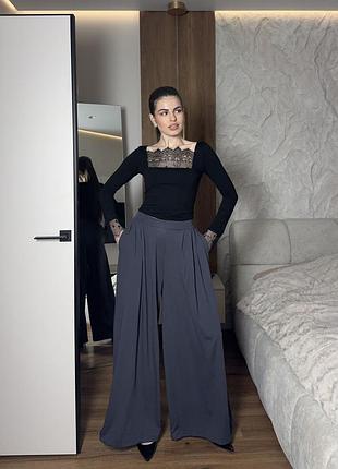 Трикотажні широкі брюки трансформери з кишенями з кулісками знизу