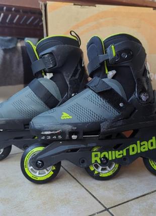 Роликовые коньки детские rollerblade съемные лезвия, черные с зеленым