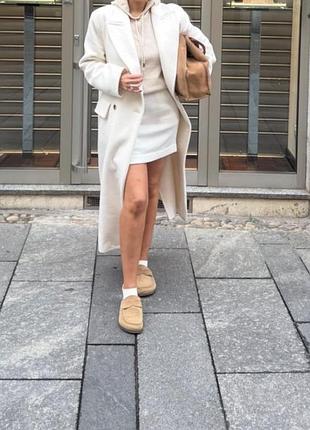 Спідниця міді молочного кольору