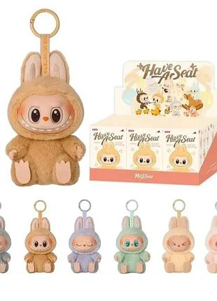 Коллекционные фигурки под названием&nbsp;pop mart labubu the monsters have a seat.&nbsp;это серия мягких игрушек с характерным дизайном.